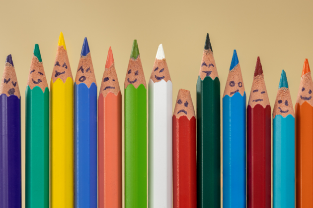 Row Of Colored Pencils With Smiling Faces