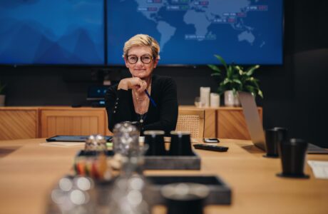 Female Executive In Corporate Boardroom