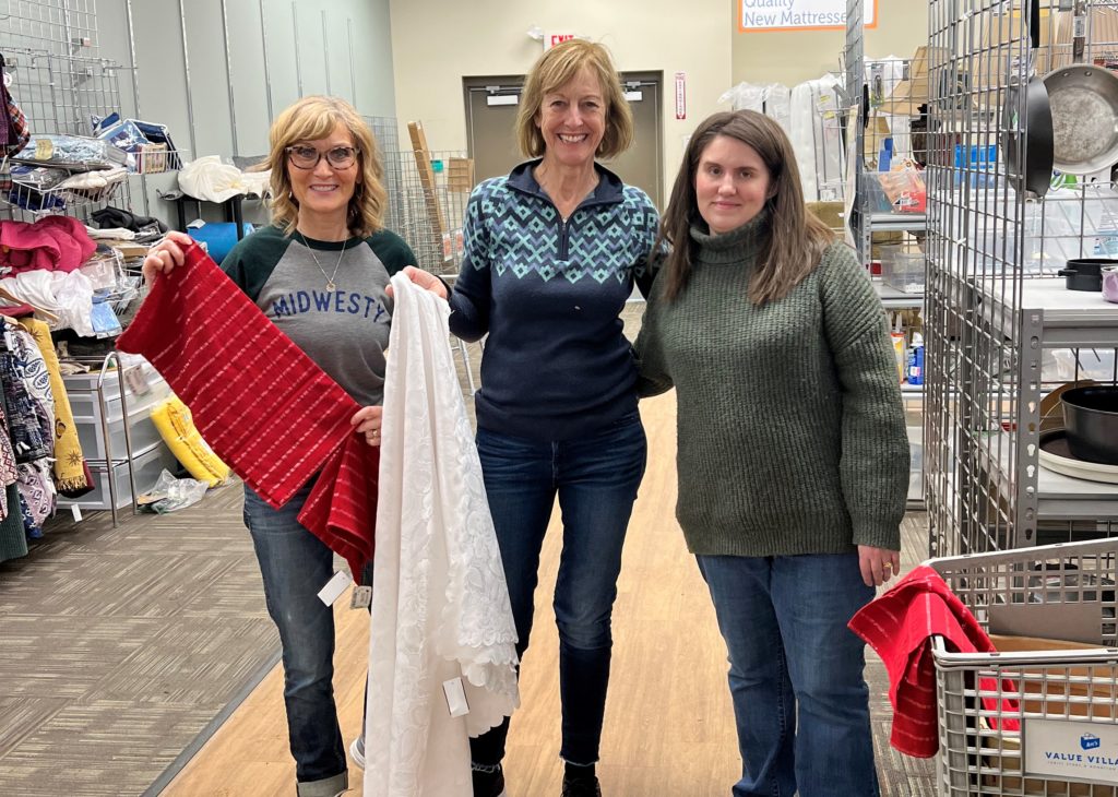 Navigate Forward leadership team volunteering at Arc Value Village